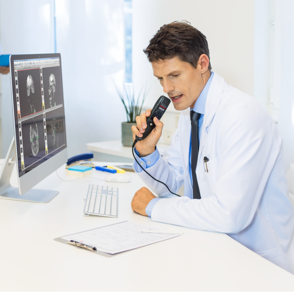 Doctor using Dragon Medical One for real-time medical speech recognition